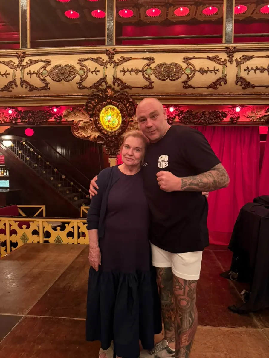 Lee with the owner of La Paloma inside the venue