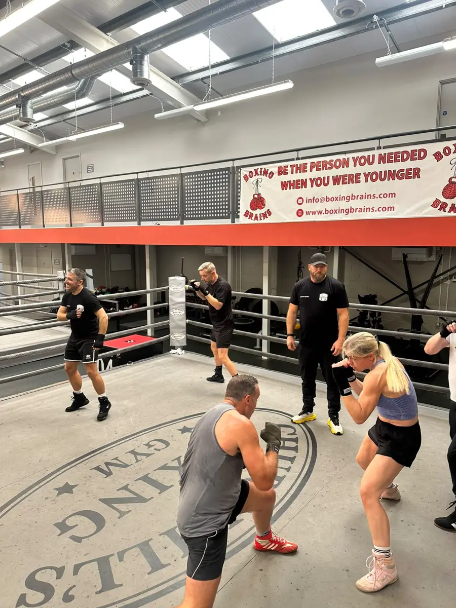 Fighters working in pairs around the ring