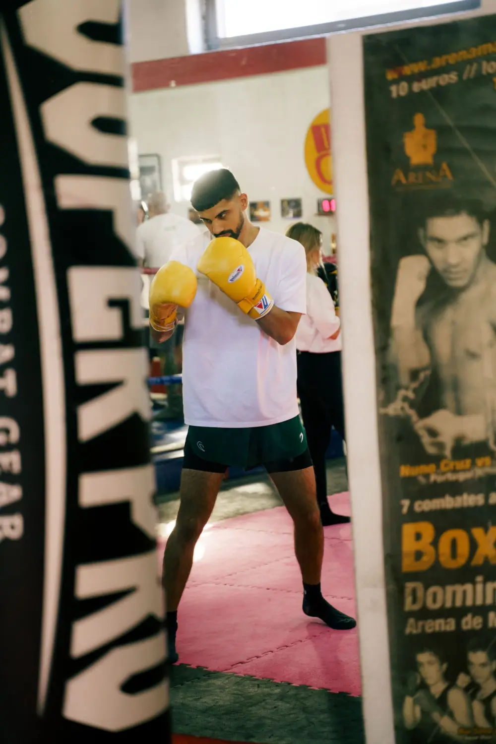 Participant practising boxing stance and footwork during a guided wellbeing session