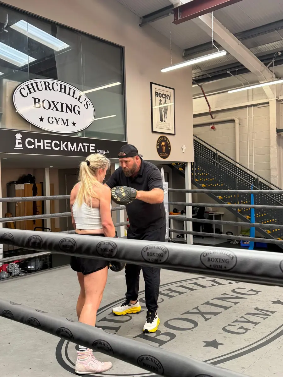 Pad work in the ring with a WBC Cares UK coach